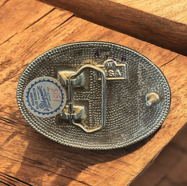 Vintage Blue Ribbon Belt Buckle – Oval Black Enamel with Silver Starburst, USA Made