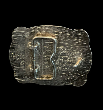 Hesston National Finals Rodeo (NFR) youth mini belt buckle from 1985, designed by Fred Fellows.