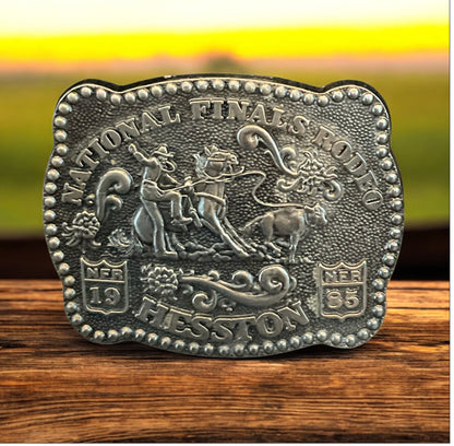Hesston National Finals Rodeo (NFR) youth mini belt buckle from 1985, designed by Fred Fellows.